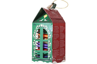 Back side panel of English Tea Shop Lantern Assortment showing tea flavors and ingredient list on a white background.