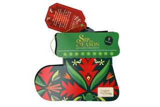 Direct front view of English Tea Shop green Santa's Stocking organic tea gift box on a white background.
