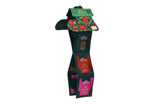 Angle view of English Tea Shop green Santa's Stocking opened into a vertical hanging display showing tea sachets.