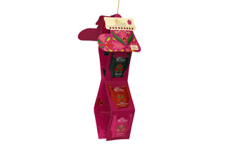 Angle view of English Tea Shop pink Santa's Stocking opened into a vertical hanging display showing tea sachets.