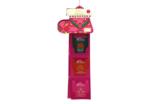Front view of English Tea Shop pink Santa's Stocking fully unfolded to display individual organic tea sachets.