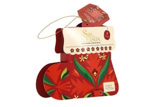 3/4 side angle view of English Tea Shop red Santa's Stocking tea gift box isolated on a white background.