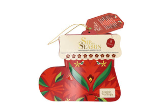 Direct front view of English Tea Shop red Santa's Stocking organic tea gift box on a white background.