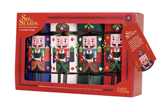 Front view of the English Tea Shop Sip the Season holiday gift set featuring 12 pyramid tea bags inside nutcracker-themed Christmas cracker packaging.